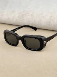 Lunettes de soleil Miu Miu SMU B13